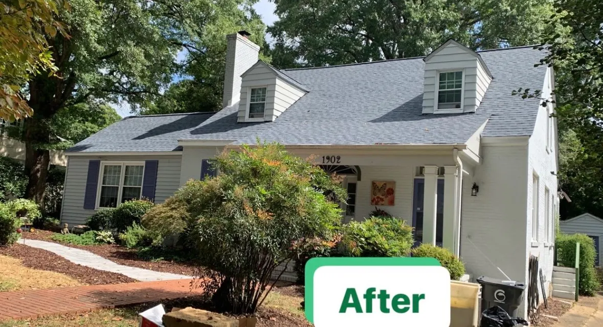 The same Greensboro cape cod after its roof replacement, labeled after